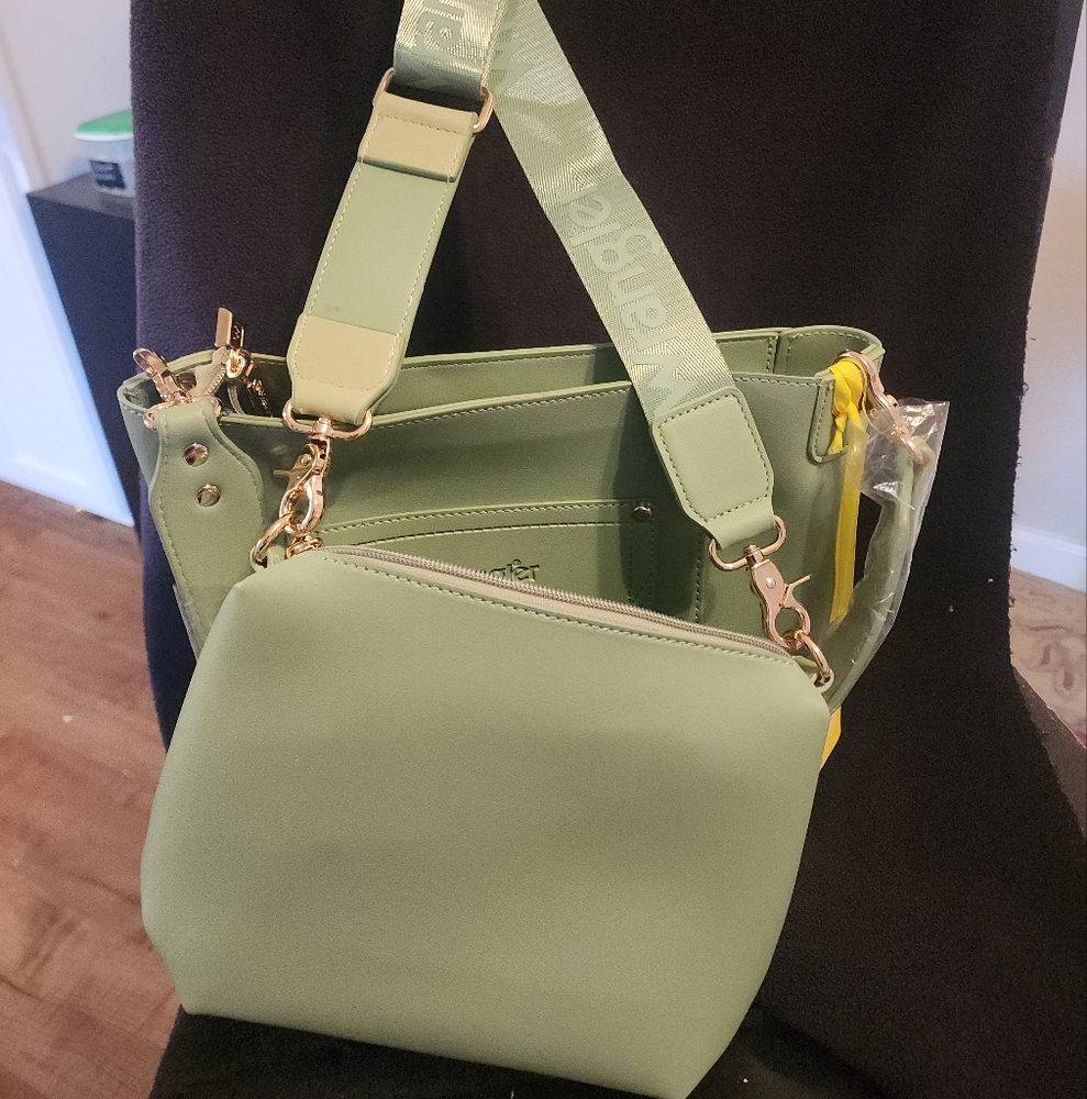 Brand New Wrangler Handbag & Makeup Bag included.